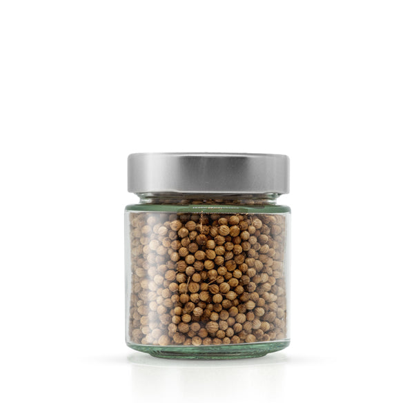 Ganze Bio Koriandersamen mit frisch-zitrusartigem Aroma im Glas.